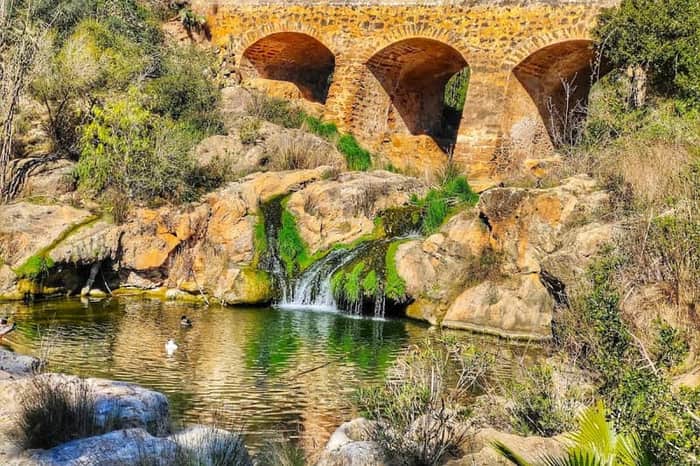 Pont Vell Roman bridge & mil de baix windmill